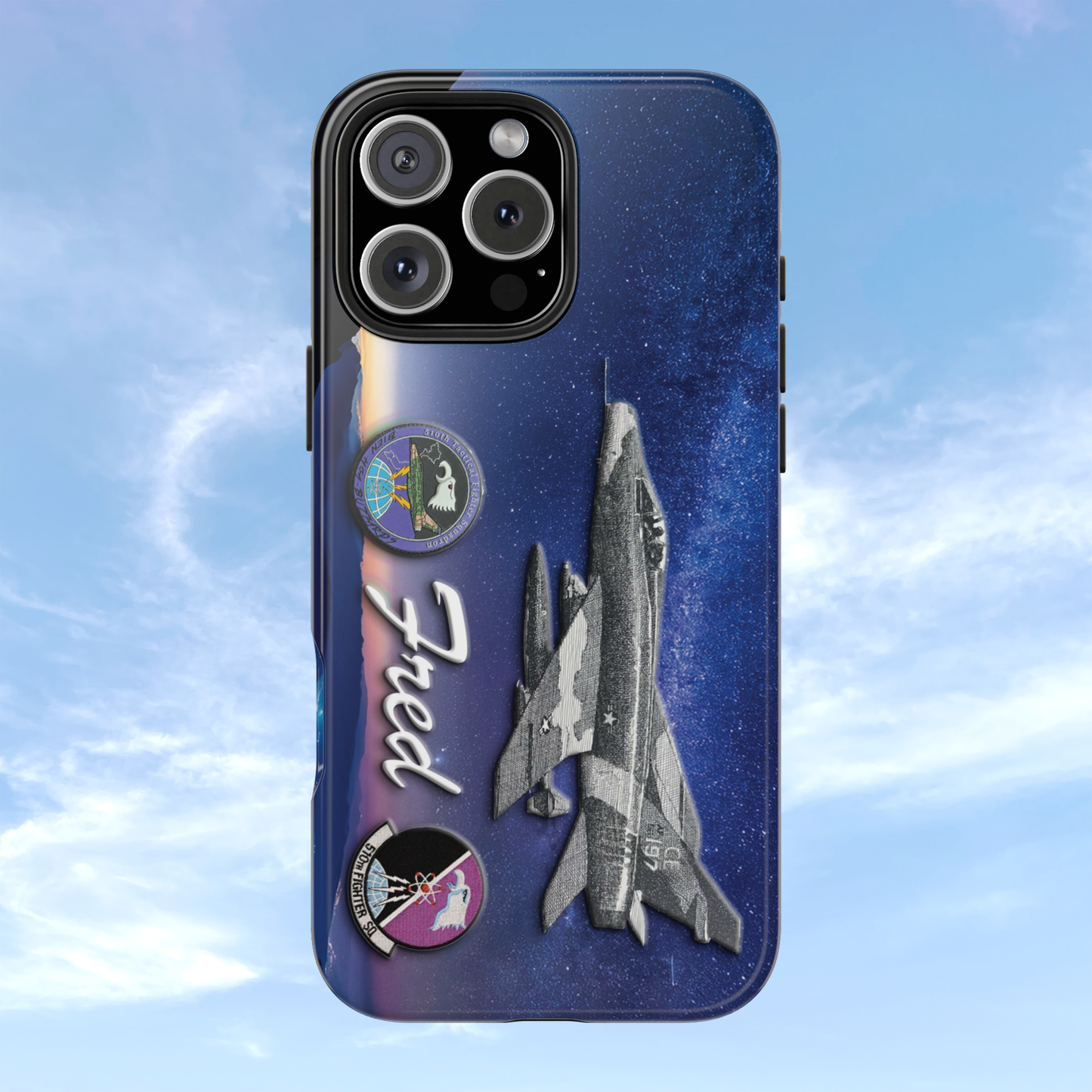 An image of an Air Force 510th Squadron cell phone case featuring a detailed F16 fighter jet design, the word "Buzzards," and personalized text displaying a name or call sign. The case has a sleek, durable finish with vibrant graphics, offering a military-inspired look. Designed for edge-to-edge protection, it includes precise cutouts for buttons, ports, and the camera, combining style and functionality.